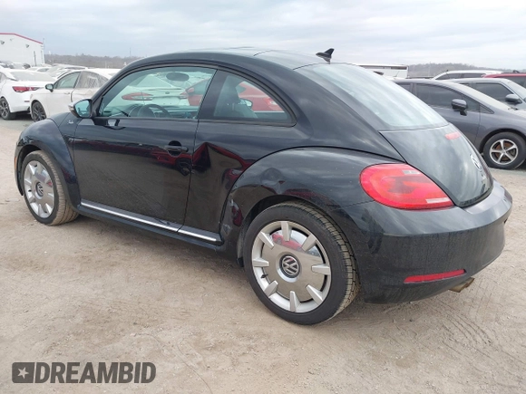 2013 Volkswagen Beetle 2.5L with VIN 3VWJP7AT8DM679548, listed as a IAAI auction lot 41459613 with 135,198 mi miles and . Bid and sale history available at DreamBid. Image 3.