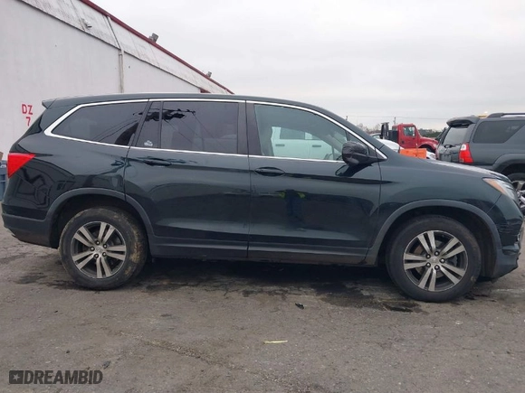 2016 Honda Pilot EX-L with VIN 5FNYF6H50GB112667, listed as a IAAI auction lot 41468703 with 166,366 mi miles. Bid and sale history available at carsss.com. Image 13.