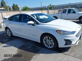 2019 Ford Fusion Hybrid SE with VIN 3FA6P0LU9KR207824, listed as a IAAI auction lot 42153330 with 69,966 mi miles. Bid and sale history available at carsss.com. Image 1.