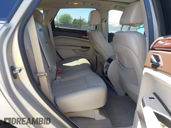 2016 Cadillac SRX Luxury Collection with VIN 3GYFNBE31GS512499, listed as a IAAI auction lot 42279523 with 49,257 mi miles and . Bid and sale history available at DreamBid. Image 8.