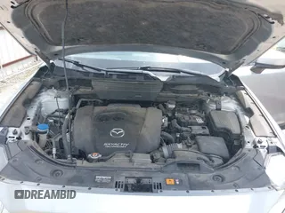 2018 Mazda CX-5 Grand Touring with VIN JM3KFADM6J0339185, listed as a IAAI auction lot 42160763 with 86,312 mi miles and . Bid and sale history available at DreamBid. Image 10.