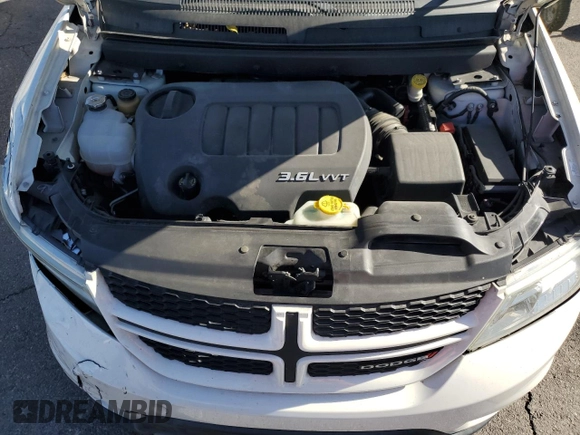 2013 Dodge Journey R/T with VIN 3C4PDCEG3DT659001, listed as a Copart auction lot 78187554 with 128,052 mi miles and Salvage title. Bid and sale history available at DreamBid. Image 12.