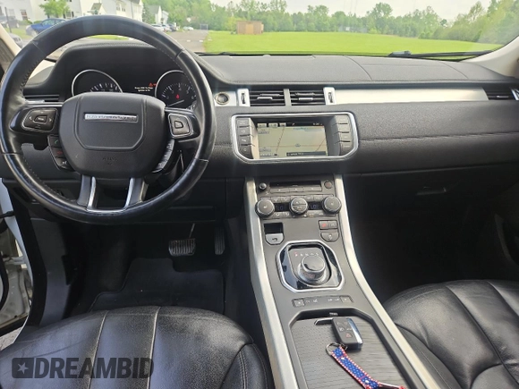 2014 Land Rover Range Rover Evoque Pure Premium z VIN SALVR2BG8EH863485, wystawiony jako Copart lot #57249785 z przebiegiem 133 937 mil mil oraz Czysty tytuł • Clean title. Historia ofert i sprzedaży dostępna na DreamBid. Obrazek 9.