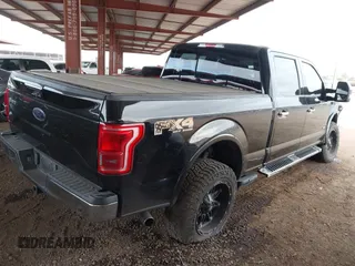 2016 Ford F-150 XLT with VIN 1FTFW1EG2GKD23694, listed as a IAAI auction lot 41573365 with 112,934 mi miles. Bid and sale history available at carsss.com. Image 4.