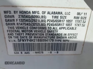 2011 Honda Pilot LX with VIN 5FNYF4H21BB094179, listed as a IAAI auction lot 42012733 with 183,546 mi miles. Bid and sale history available at carsss.com. Image 9.