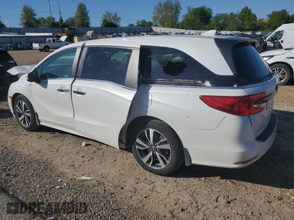 2021 Honda Odyssey Touring with VIN 5FNRL6H86MB003309, listed as a Copart auction lot 51648654 with 132,393 mi miles and Salvage Title. Bid and sale history available at carsss.com. Image 2.
