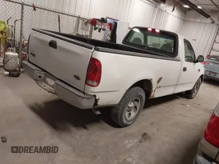 2000 Ford F-150 XL with VIN 1FTRF17W8YKB33949, listed as a IAAI auction lot 41519978 with 228,931 mi miles. Bid and sale history available at carsss.com. Image 4.