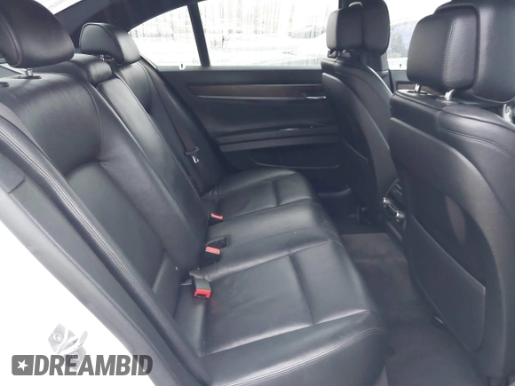 2013 BMW 7 Series 740i with VIN WBAYA6C57DC995338, listed as a IAAI auction lot 41479077 with 123,680 mi miles and . Bid and sale history available at DreamBid. Image 8.