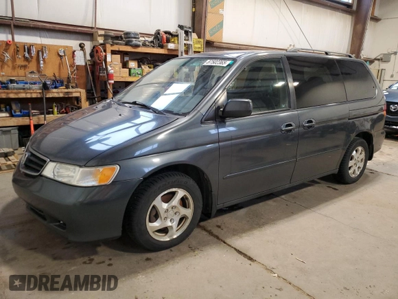 2003 Honda Odyssey EX with VIN 2HKRL18603H008412, listed as a Copart auction lot 87502365 with 352,773 mi miles and Salvage Title. Bid and sale history available at DreamBid. Image 1.