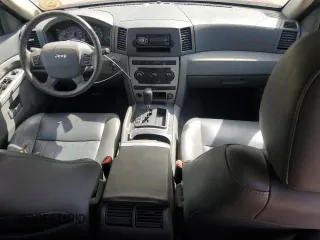 2005 Jeep Grand Cherokee with VIN 1J8HS48N55C658562, listed as a Copart auction lot 56601705 with 178,522 mi miles and Clean title. Bid and sale history available at DreamBid. Image 8.