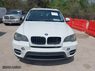 2011 BMW X5 35i with VIN 5UXZV4C57BL401794, listed as a IAAI auction lot 41897040 with 1 mi miles. Bid and sale history available at carsss.com. Image 6.