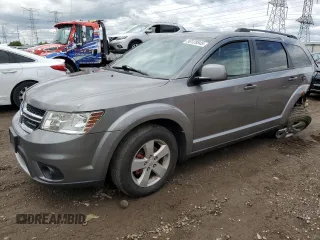 2012 Dodge Journey SXT with VIN 3C4PDCBG3CT213515, listed as a Copart auction lot 58128845 with 208,152 mi miles and Salvage title. Bid and sale history available at DreamBid. Image 1.