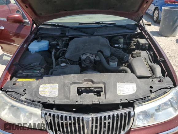 2000 Lincoln Town Car Signature with VIN 1LNHM82W2YY809189, listed as a Copart auction lot 59812665 with 148,236 mi miles and Salvage title. Bid and sale history available at DreamBid. Image 11.