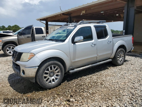 2011 Nissan Frontier SL with VIN 1N6AD0ER3BC449851, listed as a Copart auction lot 61001375 with 254,759 mi miles and Salvage title. Bid and sale history available at DreamBid. Image 1.