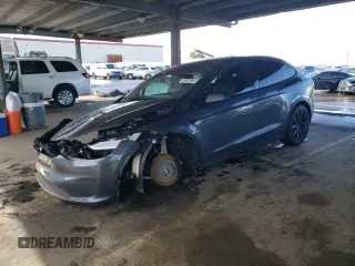 2023 Tesla Model X with VIN 7SAXCDE55PF410146, listed as a Copart auction lot 48818085 with 26,494 mi miles and Salvage Title. Bid and sale history available at DreamBid. Image 1.