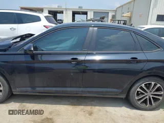 2024 Volkswagen Jetta Sport with VIN 3VWAM7BU3RM018730, listed as a IAAI auction lot 42158484 with 19,482 mi miles and . Bid and sale history available at DreamBid. Image 14.