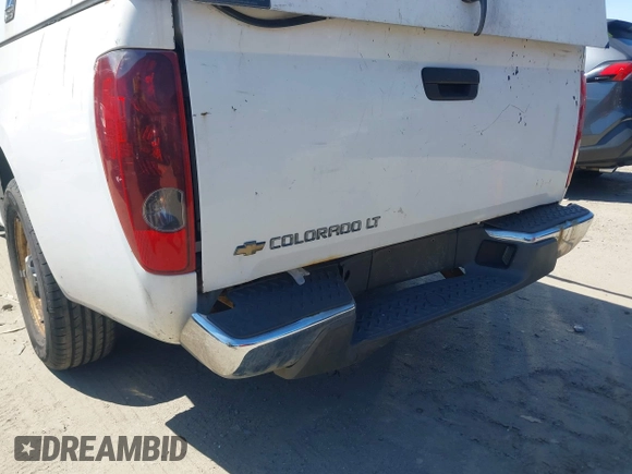 2010 Chevrolet Colorado Work Truck z VIN 1GCCSBD97A8141128, wystawiony jako IAAI lot #42052720 z przebiegiem 188 114 mil mil oraz . Historia ofert i sprzedaży dostępna na DreamBid. Obrazek 6.