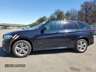 2014 BMW X5 xDrive50i with VIN 5UXKR6C5XE0J72051, listed as a Copart auction lot 50869574 with 129,875 mi miles and Salvage Title. Bid and sale history available at carsss.com. Image 1.