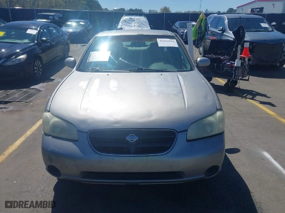 2000 Nissan Maxima GXE with VIN JN1CA31D8YT551822, listed as a IAAI auction lot 41845010 with 297,479 mi miles. Bid and sale history available at carsss.com. Image 12.