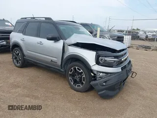 2021 Ford Bronco Sport Outer Banks z VIN 3FMCR9C67MRB12092, wystawiony jako IAAI lot #42075660 z przebiegiem 40 845 mil mil oraz . Historia ofert i sprzedaży dostępna na DreamBid. Obrazek 1.