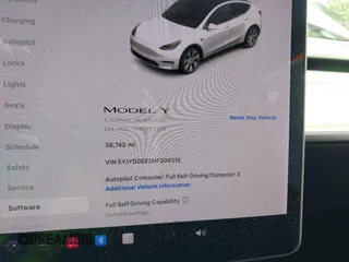2021 Tesla Model Y Long Range z VIN 5YJYGDEE2MF200315, wystawiony jako IAAI lot #42233599 z przebiegiem 38 742 mil mil oraz . Historia ofert i sprzedaży dostępna na DreamBid. Obrazek 14.
