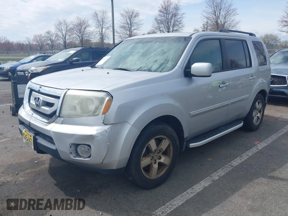 2011 Honda Pilot EX-L with VIN 5FNYF4H68BB017361, listed as a IAAI auction lot 41933024 with 338,819 mi miles and . Bid and sale history available at carsss.com. Image 15.