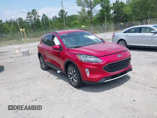 2020 Ford Escape Titanium z VIN 1FMCU9J92LUA39457, wystawiony jako IAAI lot #42222441 z przebiegiem 107 148 mil mil oraz . Historia ofert i sprzedaży dostępna na DreamBid. Obrazek 1.