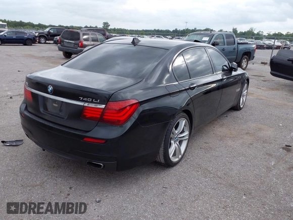 2014 BMW 7 Series 740Li with VIN WBAYE4C51ED138744, listed as a IAAI auction lot 42254213 with 116,157 mi miles and . Bid and sale history available at DreamBid. Image 4.