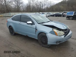 2008 Ford Focus SE z VIN 1FAHP33N48W204502, wystawiony jako Copart lot #53145615 z przebiegiem Nie podano mil oraz Szkoda całkowita • Salvage title. Historia ofert i sprzedaży dostępna na DreamBid. Obrazek 4.