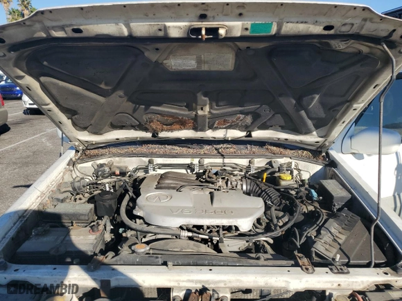 2001 Infiniti QX4 Luxury with VIN JNRDR09Y51W212522, listed as a Copart auction lot 77044784 with 308949 miles and Clean Title. Bid and sale history available at carsss.com. Image 12.