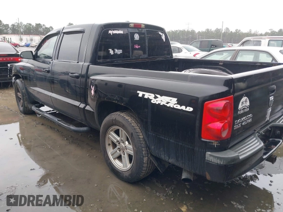 2007 Dodge Dakota SLT z VIN 1D7HW48P87S271192, wystawiony jako IAAI lot #41421142 z przebiegiem 198 588 mil mil oraz . Historia ofert i sprzedaży dostępna na DreamBid. Obrazek 3.