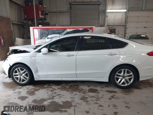 2016 Ford Fusion SE with VIN 3FA6P0H7XGR323544, listed as a IAAI auction lot 42022388 with 188,097 mi miles and . Bid and sale history available at DreamBid. Image 14.