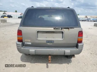 1996 Jeep Grand Cherokee Limited with VIN 1J4GZ78S3TC395758, listed as a Copart auction lot 60326205 with Not provided miles and Salvage title. Bid and sale history available at DreamBid. Image 6.