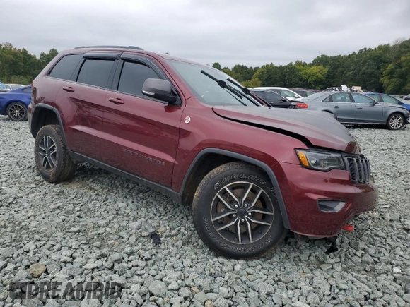 2019 Jeep Grand Cherokee Trailhawk with VIN 1C4RJFLT9KC718628, listed as a Copart auction lot 72646234 with 94,980 mi miles and Salvage title. Bid and sale history available at DreamBid. Image 4.