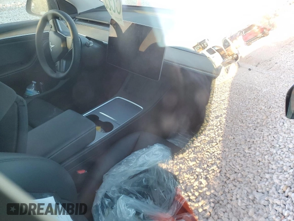 2023 Tesla Model Y Long Range z VIN 7SAYGDEE1PA078373, wystawiony jako Copart lot #48169175 z przebiegiem Nie podano mil oraz Szkoda całkowita • Salvage title. Historia ofert i sprzedaży dostępna na DreamBid. Obrazek 8.