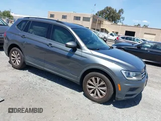 2018 Volkswagen Tiguan S with VIN 3VV1B7AX3JM058641, listed as a IAAI auction lot 42288551 with 74,199 mi miles and . Bid and sale history available at DreamBid. Image 1.