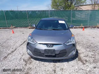 2017 Hyundai Veloster with VIN KMHTC6AD8HU305853, listed as a IAAI auction lot 41915404 with 115,663 mi miles. Bid and sale history available at carsss.com. Image 12.