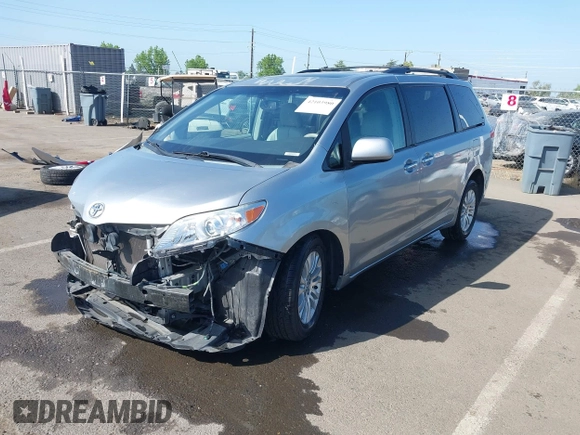 2011 Toyota Sienna XLE AAS with VIN 5TDYK3DC8BS156127, listed as a IAAI auction lot 42103980 with 129,851 mi miles. Bid and sale history available at carsss.com. Image 2.