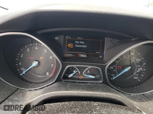 2018 Ford Focus SE with VIN 1FADP3F23JL214428, listed as a Copart auction lot 60552465 with 33,699 mi miles and Salvage title. Bid and sale history available at DreamBid. Image 8.