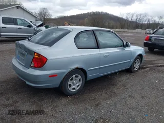 2005 Hyundai Accent GLS with VIN KMHCG35C85U354423, listed as a IAAI auction lot 41939445 with 134,952 mi miles. Bid and sale history available at carsss.com. Image 4.