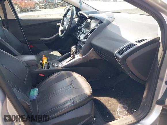 2014 Ford Focus Titanium with VIN 1FADP3J27EL227261, listed as a IAAI auction lot 41972536 with 172,470 mi miles. Bid and sale history available at carsss.com. Image 5.