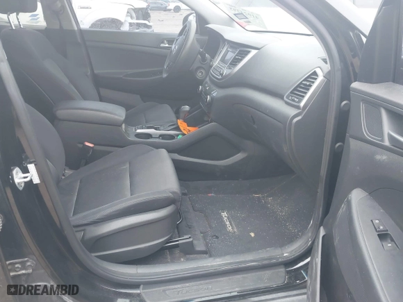 2017 Hyundai Tucson Value with VIN KM8J33A27HU388910, listed as a IAAI auction lot 41101112 with 107,138 mi miles. Bid and sale history available at carsss.com. Image 5.