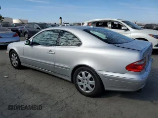 2000 Mercedes-Benz CLK 320/430 with VIN WDBLJ65G8YF122308, listed as a Copart auction lot 77449314 with 105,121 mi miles and Salvage Title. Bid and sale history available at DreamBid. Image 2.