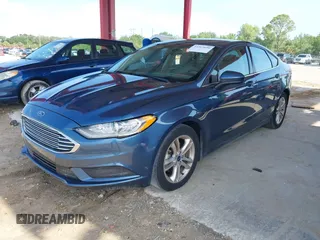 2018 Ford Fusion SE z VIN 3FA6P0HD8JR201052, wystawiony jako IAAI lot #42367050 z przebiegiem 90 502 mil mil oraz . Historia ofert i sprzedaży dostępna na DreamBid. Obrazek 17.