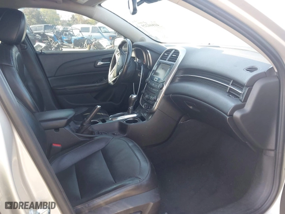 2015 Chevrolet Malibu LTZ with VIN 1G11F5SL0FF336477, listed as a IAAI auction lot 41844225 with 121,384 mi miles. Bid and sale history available at carsss.com. Image 5.
