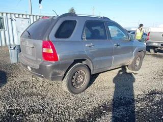 2006 Kia Sportage LX with VIN KNDJE723X67242610, listed as a IAAI auction lot 41735144 with 244,979 mi miles and . Bid and sale history available at DreamBid. Image 4.