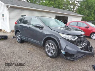 2018 Honda CR-V EX z VIN 7FARW2H50JE094132, wystawiony jako IAAI lot #42337889 z przebiegiem 59 273 mil mil oraz . Historia ofert i sprzedaży dostępna na DreamBid. Obrazek 1.