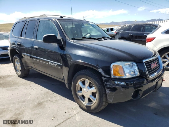 2005 GMC Envoy SLE with VIN 1GKDT13S752390266, listed as a Copart auction lot 50766935 with 115,225 mi miles and Salvage Title. Bid and sale history available at carsss.com. Image 4.