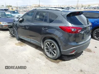 2016 Mazda CX-5 Grand Touring with VIN JM3KE4DY7G0643643, listed as a IAAI auction lot 42077497 with 120,343 mi miles and . Bid and sale history available at carsss.com. Image 3.