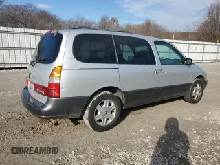 2001 Mercury Villager z VIN 4M2ZV12T21DJ09828, wystawiony jako Copart lot #89139355 z przebiegiem 131 388 mil mil oraz Szkody całkowita. Historia ofert i sprzedaży dostępna na DreamBid. Obrazek 3.